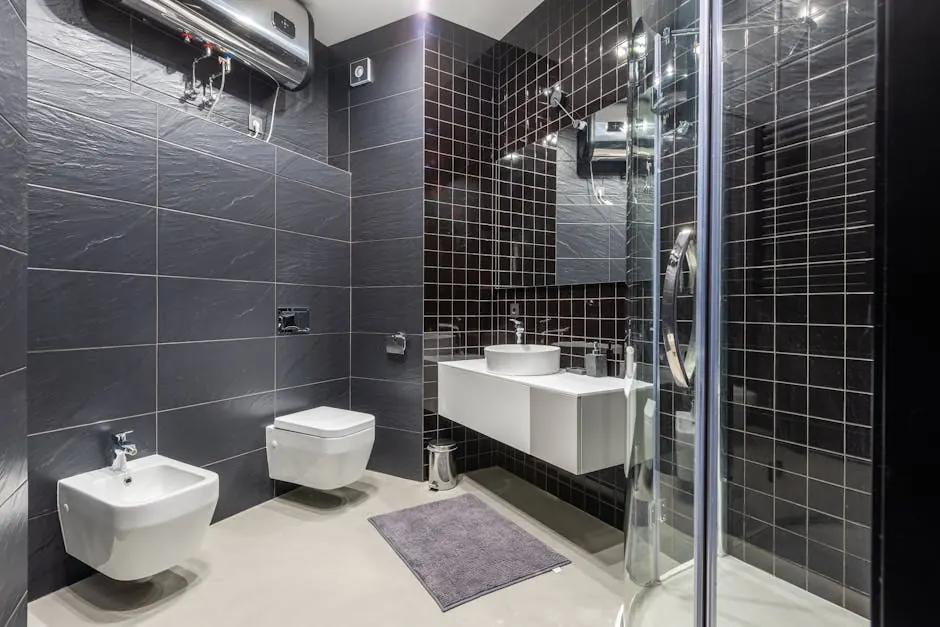Interior design of modern bathroom with shower and bidet decorated with black tile